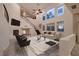 Spacious living room features high ceilings, cozy fireplace, abundant natural light, and stylish decor at 386 Wiseton Ave, Las Vegas, NV 89183