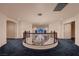 Grand second floor loft with decorative staircase and dark carpeting, offering a stylish living area at 386 Wiseton Ave, Las Vegas, NV 89183
