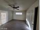 Bedroom featuring a ceiling fan, new hardwood floors, and a window providing ample sunlight at 4321 El Conlon Ave, Las Vegas, NV 89102