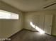 Bedroom featuring hardwood floors, neutral paint, and closet doors at 4321 El Conlon Ave, Las Vegas, NV 89102
