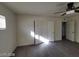 Bedroom with new floors, ceiling fan, neutral paint and closet at 4321 El Conlon Ave, Las Vegas, NV 89102