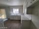 Bright kitchen featuring granite-style countertops, and stainless steel sink at 4321 El Conlon Ave, Las Vegas, NV 89102