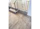The steps on a staircase featuring recently installed vinyl flooring and a modern iron railing at 4321 El Conlon Ave, Las Vegas, NV 89102