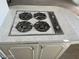 Close-up of the kitchen's gas cooktop with granite-style countertops at 4321 El Conlon Ave, Las Vegas, NV 89102