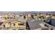 An elevated view overlooking a neighborhood and a city skyline in the distance at 436 Crown Mesa Ave, Las Vegas, NV 89138