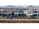 Home with outdoor living space, covered patio, and mountain views at 436 Crown Mesa Ave, Las Vegas, NV 89138