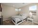 Cozy bedroom with carpet, a comfortable bed, and a window view providing natural light at 436 Crown Mesa Ave, Las Vegas, NV 89138