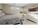 Bright bedroom with stylish dresser and modern decor showcasing natural light and comfort at 436 Crown Mesa Ave, Las Vegas, NV 89138