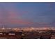 Nighttime skyline view of Las Vegas showcasing vibrant city lights and the surrounding mountains at 436 Crown Mesa Ave, Las Vegas, NV 89138