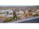 Contemporary home with gray roof, modern garage door, and drought-tolerant landscaping in a planned community at 436 Crown Mesa Ave, Las Vegas, NV 89138