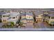 Contemporary home with gray roof, modern garage door, and drought-tolerant landscaping in a planned community at 436 Crown Mesa Ave, Las Vegas, NV 89138