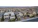 Contemporary home with gray roof, modern garage door, and drought-tolerant landscaping in a planned community at 436 Crown Mesa Ave, Las Vegas, NV 89138