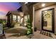 Inviting front entrance with a decorative wreath, stylish door, and landscaped yard at 436 Crown Mesa Ave, Las Vegas, NV 89138
