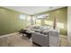 Relaxing living room with modern furniture and attractive green walls at 436 Crown Mesa Ave, Las Vegas, NV 89138
