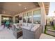 Outdoor patio with comfortable seating, a ceiling fan, and an outdoor view at 436 Crown Mesa Ave, Las Vegas, NV 89138