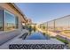 Backyard pool area with a spa, landscaping, and an amazing view at 436 Crown Mesa Ave, Las Vegas, NV 89138