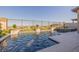 Backyard pool featuring beautiful tile, greenery, and privacy with an expansive view at 436 Crown Mesa Ave, Las Vegas, NV 89138