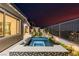 Beautiful backyard pool and spa featuring modern tile and landscaping at 436 Crown Mesa Ave, Las Vegas, NV 89138