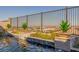 Close up of a gorgeous, private pool with planters and a soothing waterfall feature at 436 Crown Mesa Ave, Las Vegas, NV 89138