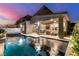 Inviting outdoor space with a pool, covered patio, and comfortable seating, perfect for relaxing at 436 Crown Mesa Ave, Las Vegas, NV 89138
