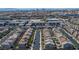 Expansive aerial view of a well-planned community with orderly streets and rooftops at 4634 Observed St, North Las Vegas, NV 89031