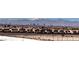 Panoramic aerial showcasing community, cityscape, and snow-capped mountains in the distance at 472 Via Stretto Ave, Henderson, NV 89011