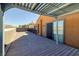 Wide back deck featuring modern pergola, offering a stunning view of the surrounding area at 472 Via Stretto Ave, Henderson, NV 89011