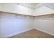 Walk-in closet providing ample storage with shelving and hanging space at 472 Via Stretto Ave, Henderson, NV 89011