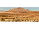 Desert landscape with beautiful mountains, a rustic fence, and native vegetation at 472 Via Stretto Ave, Henderson, NV 89011