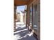 Exterior patio featuring a charming brick design and a view of the well-maintained yard at 472 Via Stretto Ave, Henderson, NV 89011