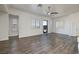 Bright living room with a sliding door, and lots of natural light coming through the windows at 472 Via Stretto Ave, Henderson, NV 89011