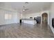 Open floor plan living room with a fireplace, and lots of natural light at 472 Via Stretto Ave, Henderson, NV 89011