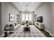 Spacious living room featuring large windows, neutral colors, and elegant decor at 472 Via Stretto Ave, Henderson, NV 89011