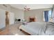Cozy bedroom featuring a fireplace, study area, and comfortable bed at 4773 Sarazen Cir, Las Vegas, NV 89103