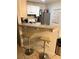 Bright eat-in kitchen with bar seating and stainless steel appliances at 520 Elm Dr # 202, Las Vegas, NV 89169