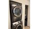 Modern stackable washer and dryer set with view into closet at 520 Elm Dr # 202, Las Vegas, NV 89169
