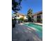 Community pool with cool blue water nestled between two-story apartment buildings at 520 Elm Dr # 202, Las Vegas, NV 89169