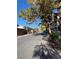 Serene street view showcasing the well-kept landscaping and architecture of the community at 520 Elm Dr # 202, Las Vegas, NV 89169