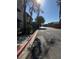 Apartment complex features a paved street and landscaped border, providing a welcoming entrance at 520 Elm Dr # 202, Las Vegas, NV 89169
