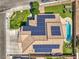 Overhead view of a house with solar panels, a pool, and landscaped backyard at 6301 Citrine Ave, Las Vegas, NV 89130