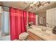 The bathroom features a shower with bathtub and a vanity with plenty of counter space at 6301 Citrine Ave, Las Vegas, NV 89130