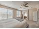 Bright, well-lit bedroom with ceiling fan and multiple windows offering lots of natural light at 6301 Citrine Ave, Las Vegas, NV 89130
