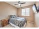 Comfortable bedroom with large window and neutral colors at 6301 Citrine Ave, Las Vegas, NV 89130