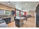 Enjoy this modern kitchen and dining area with views to the outdoor pool area at 6301 Citrine Ave, Las Vegas, NV 89130