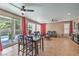 The open concept living room and dining table are adjacent to the outdoor pool area at 6301 Citrine Ave, Las Vegas, NV 89130