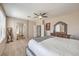 Spacious main bedroom with en suite bath access, ceiling fan, and ample natural light at 6301 Citrine Ave, Las Vegas, NV 89130