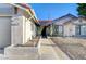Charming single-story home with stucco and red tile roof and manicured desert landscaping at 6771 Shelter Ln, Las Vegas, NV 89103