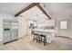 Bright, white kitchen with stainless steel appliances, a center island, and plenty of cabinet space at 6771 Shelter Ln, Las Vegas, NV 89103