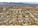 Aerial shot showcasing neighborhood with swimming pools, tennis courts, and diverse architectural styles at 6908 Bienville St, Las Vegas, NV 89131
