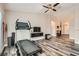 Spacious area for working out, complete with wood flooring, a television, and an open view at 6908 Bienville St, Las Vegas, NV 89131